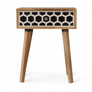 Mid-century mango wood nightstand with a single honeycomb bone inlay drawer, front view highlighting tapered legs and minimalist design