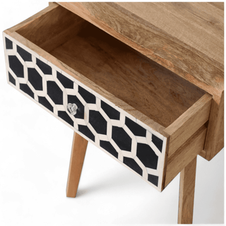 Open drawer view of mid-century mango wood nightstand with a honeycomb bone inlay, showcasing spacious storage and detailed design