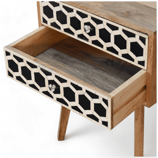 Open drawer view of mango wood nightstand with honeycomb bone inlay, highlighting smooth sliding mechanism and spacious storage