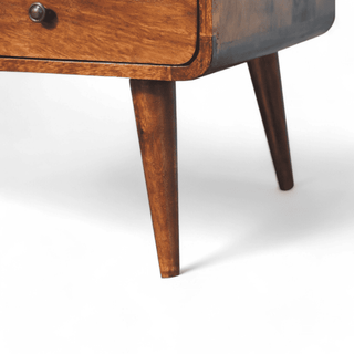 Bottom view of the coffee table, showing the frame construction and the underside of the drawers.