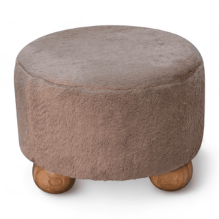 Close-up of the top surface of the brown faux fur footstool, emphasizing its soft and plush texture.