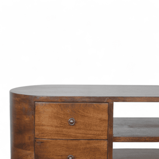 Close-up of the Chestnut Round Media Unit’s drawers with brass knob details.