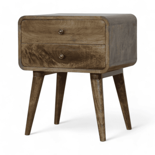 Angled view of a grey-washed mid-century modern nightstand with a sleek Scandinavian design.