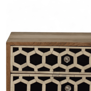 Close-up of honeycomb bone inlay pattern on mango wood nightstand drawer, showcasing intricate craftsmanship