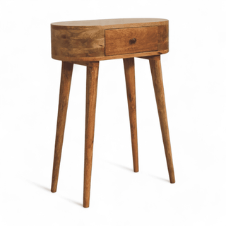 Right-angled view of a light wooden console table with an oval shape, single drawer, and sleek tapered legs.