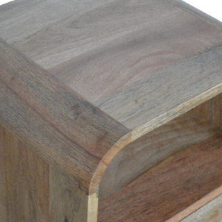 Close-up of the mango wood surface displaying natural wood grain and rich texture.