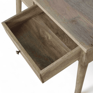 Close-up view of an open drawer from a mid-century modern console table, showcasing its spacious interior, smooth wood finish, and minimalist craftsmanship.