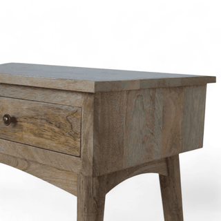 Side view close-up of a mid-century modern console table, showcasing its natural wood grain, smooth finish, and sturdy craftsmanship with a sleek drawer design.