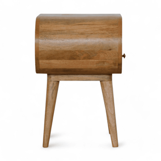 Side view of the oval-shaped mid-century modern nightstand showcasing its curved wooden design and sturdy legs.