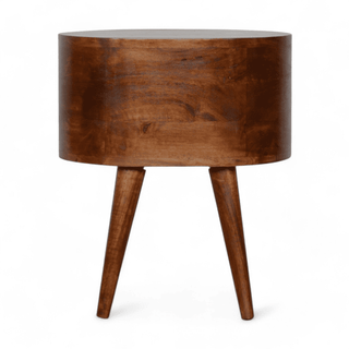 Rear view of round mango wood nightstand, highlighting its solid back panel and retro-inspired minimalist construction