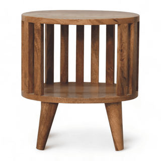 Handcrafted mid-century modern round nightstand in solid mango wood, front view showcasing open slatted design and natural finish